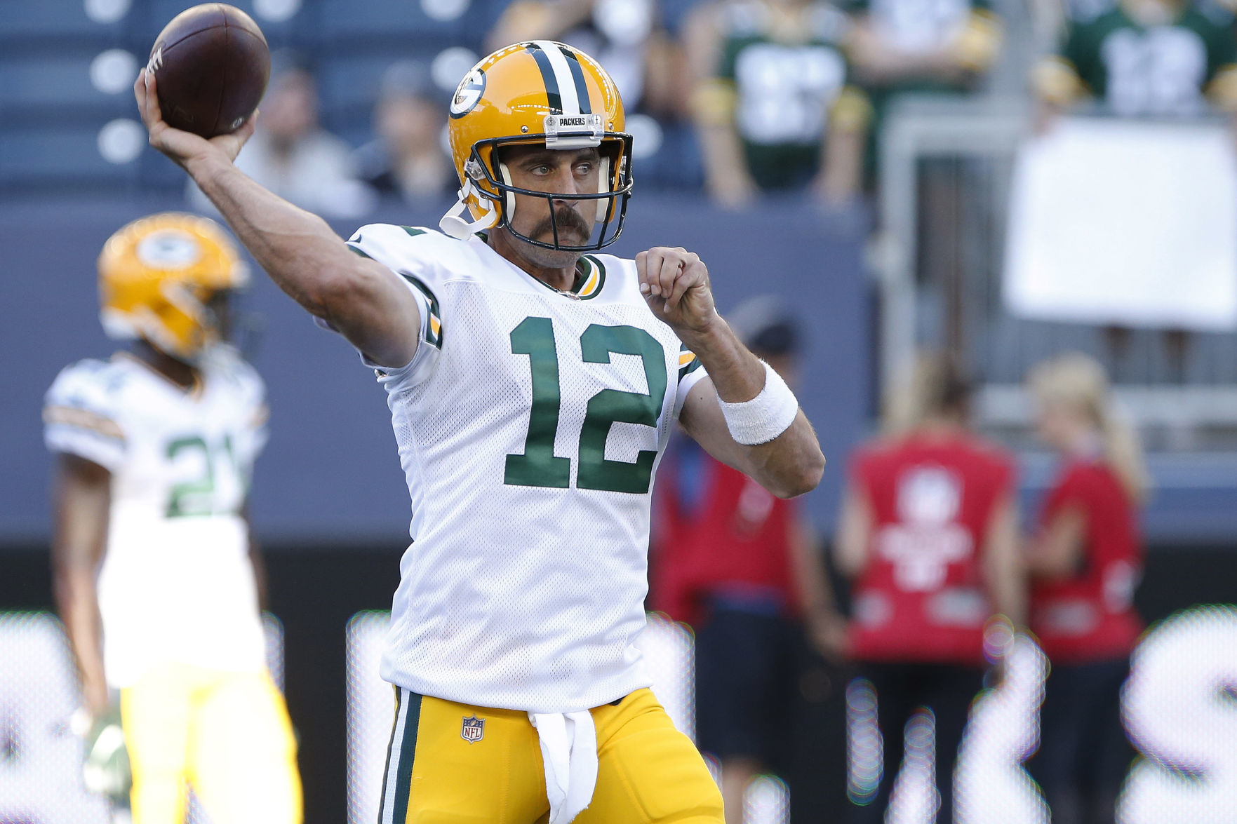 Aaron Rodgers warms up, preseason, AP photo